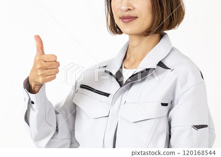 A woman wearing work clothes on a white background A woman wearing work clothes on a white background 120168544