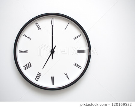 Clock Showing 19.00 or 07.00 with Roman Numerals. Simple Round Clock for Concepts of Time Management and Scheduling. Clock Showing 19.00 or 07.00 with Roman Numerals. Simple Round Clock for Concepts of Time Management and Scheduling. 120169582