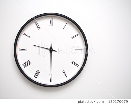 Clock Showing 21.30 or 09.30 with Roman Numerals. Simple Round Clock for Concepts of Time Management and Scheduling. 120170079