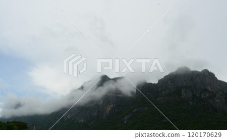 Cloud and fog cover limestone mountain in the rainy season, Green forest and rock at Khao Sam Roi Yot National Park, Thailand 120170629