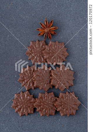 Chocolate candies in the shape of snowflakes. Chocolate candies in the shape of snowflakes. 120170972