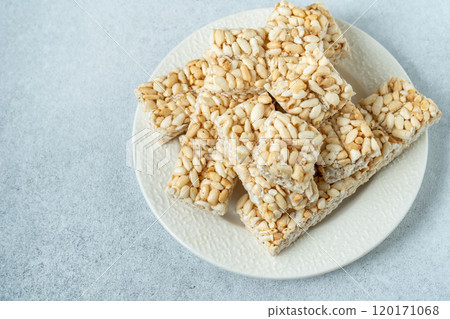 Sweet puffed rice. Food dessert crispy cracker with sugar 120171068