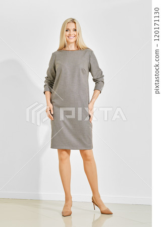 Elegant woman in houndstooth dress Elegant woman in houndstooth dress 120171130
