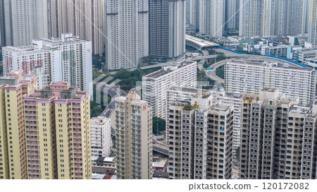 Dense Hammer Hill Cityscape With Tall Buildings And Clouds 120172082