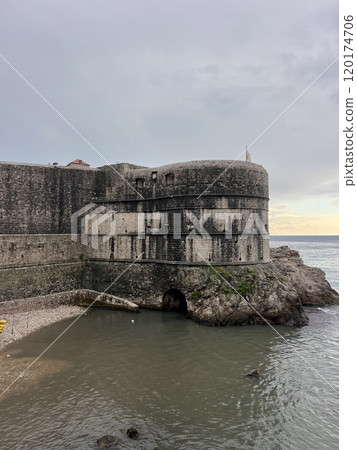 A picture of the fortress on the edge of Dubrovnik from the vantage point of the wall around the Old Town of Dubrovnik. Croatia. Europe. Adriatic. 120174706