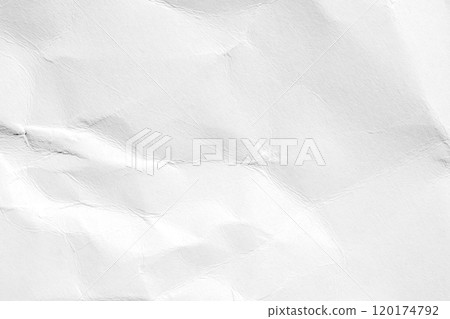 Crumpled white paper with subtle wrinkles creating a textured abstract background for use in minimalist posters and web banners with a raw aesthetic 120174792