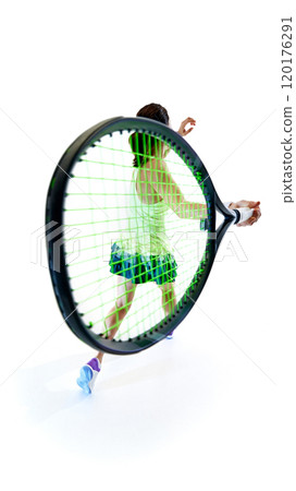 Athlete in motion, racket drawn back for powerful serve, showcasing strength, control, and intense focus against white studio background. 120176291