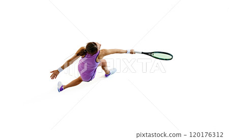 In motion, female tennis player lunges towards ball, body extended to its limits against white studio background. 120176312