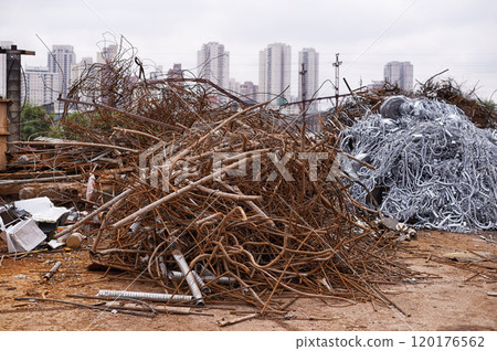 One mans trash is another mans treasure. Piles of different metal in a scrapyard. 120176562