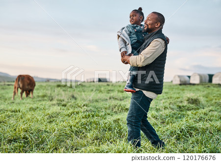 Nothing says family-friendly like an outing to the farm. Shot of a mature man carrying his adorable daughter on a cow farm. Nothing says family-friendly like an outing to the farm. Shot of a mature man carrying his adorable daughter on a cow farm. 120176676