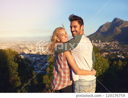 Its so beautiful out here. Portrait of an affectionate young couple admiring the view outdoors. 120176759