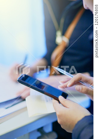 Connected to all things medical. Cropped shot of a doctor using a mobile phone. Connected to all things medical. Cropped shot of a doctor using a mobile phone. 120176808