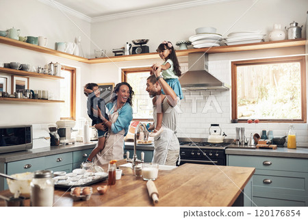 The secret ingredient in baking is always love. Shot of a young family spending quality time together in the kitchen at home. The secret ingredient in baking is always love. Shot of a young family spending quality time together in the kitchen at home. 120176854