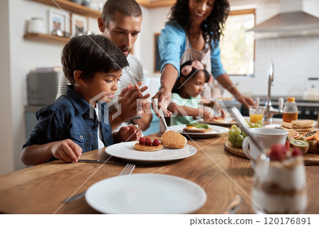 Pancakes make breakfast my favorite meal of the day. Shot of a family of four enjoying breakfast together at home. Pancakes make breakfast my favorite meal of the day. Shot of a family of four enjoying breakfast together at home. 120176891