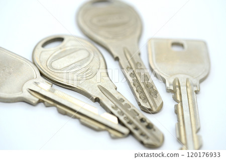 Two types of locks, one high security lock and one low security lock, on a white background 120176933