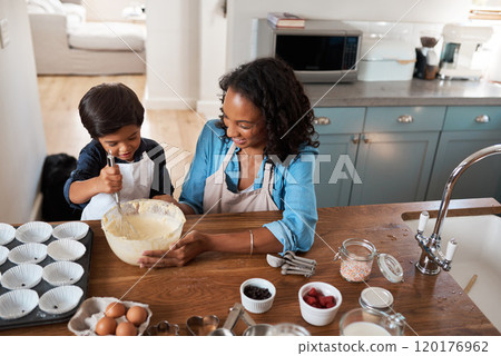 Why buy it when you can have fun doing it yourself. Shot of a woman baking at home with her young son. Why buy it when you can have fun doing it yourself. Shot of a woman baking at home with her young son. 120176962