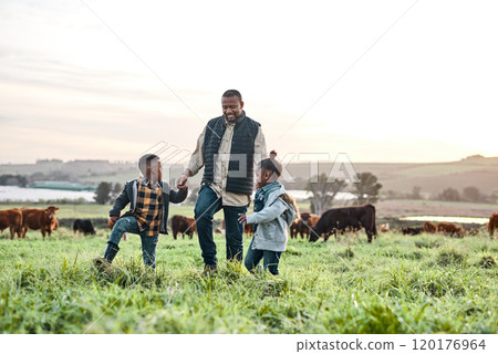 Childhood dreams are made of days like these. Shot of an adorable brother and sister having fun with their father on a farm. Childhood dreams are made of days like these. Shot of an adorable brother and sister having fun with their father on a farm. 120176964