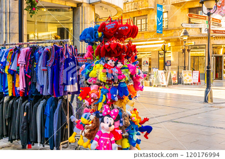 colorful souvenirs hanging on the street colorful souvenirs hanging on the street 120176994
