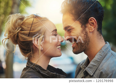 You are one in a million. Shot of a young couple out in the city. 120176998