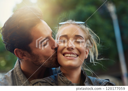 Be with someone who brings out the best in you. Shot of a young couple out in the city. 120177059