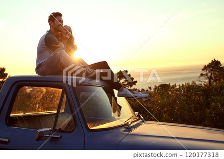 They took the romantic route on their road trip. Shot of an affectionate young couple on a roadtrip. They took the romantic route on their road trip. Shot of an affectionate young couple on a roadtrip. 120177318