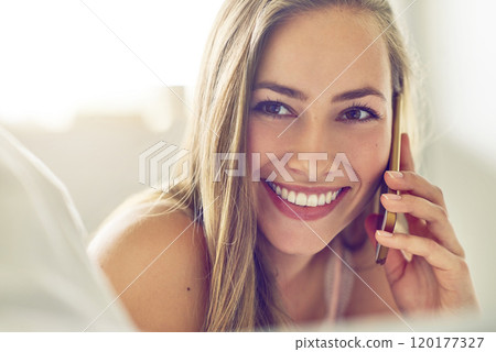 I had a dream about you last night...Shot of a young woman talking on her phone at home. I had a dream about you last night...Shot of a young woman talking on her phone at home. 120177327