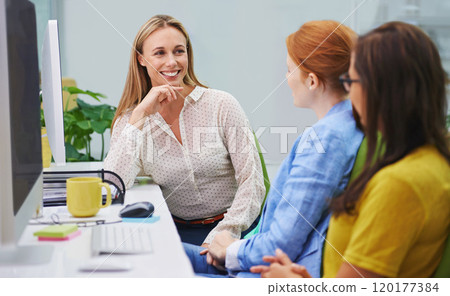I am so happy with your progress. Shot of an attractive business woman having a discussion with other female coworkers in an office setting. 120177384