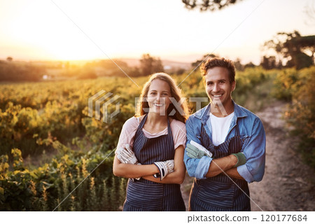 We have access to fresh produce all year long. Portrait of a confident young man and woman working together on a farm. We have access to fresh produce all year long. Portrait of a confident young man and woman working together on a farm. 120177684