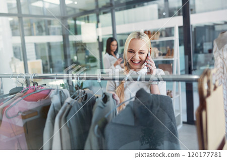 This boutique you told me about has amazing stuff. Cropped shot of a young woman talking on her cellphone while out shopping for clothes. This boutique you told me about has amazing stuff. Cropped shot of a young woman talking on her cellphone while out shopping for clothes. 120177781