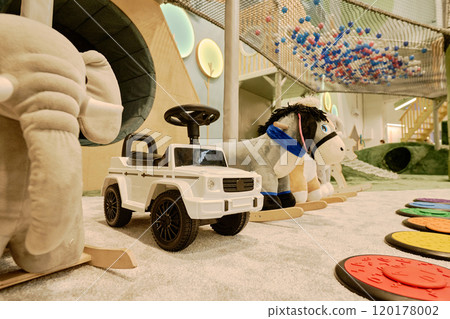 Automobile standing between soft toys 120178002