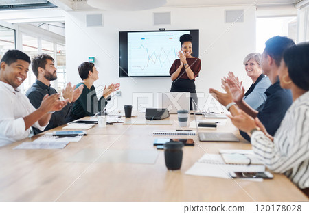 Another impressive business presentation in the bag. Shot of a group of businesspeople clapping during a meeting in a modern office. 120178028