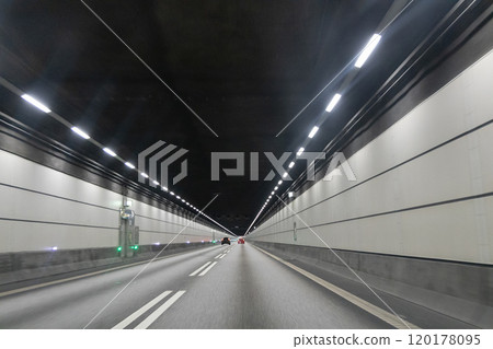 High-speed road tunnel view from a fast-moving car. High-speed road tunnel view from a fast-moving car. 120178095