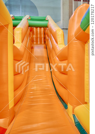 Long and steep soft orange leather slide 120178217