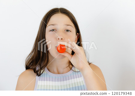 Asthma Disease. Teengirl having asthmatic attack and using inhaler preventing respiratory depression Asthma Disease. Teengirl having asthmatic attack and using inhaler preventing respiratory depression 120179348