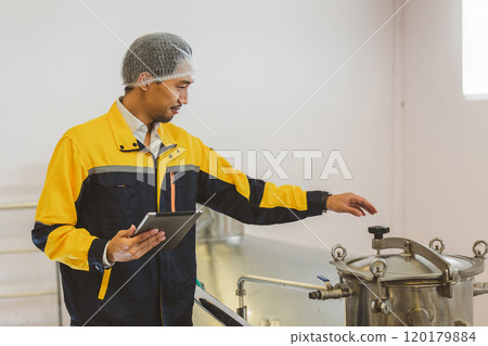 Winemaker working in modern large winery factory liquor drink industry quality. Staff inspecting wine in modern wine factory. Winery manufacturing quality control. Alcohol and wine winemaking process Winemaker working in modern large winery factory liquor drink industry quality. Staff inspecting wine in modern wine factory. Winery manufacturing quality control. Alcohol and wine winemaking process 120179884