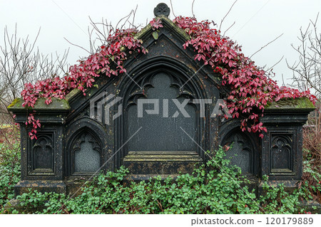 gothic granite headstone features arched top intricate details surrounded vibrant vines and foliage creating serene and mystical atmosphere nature. 120179889