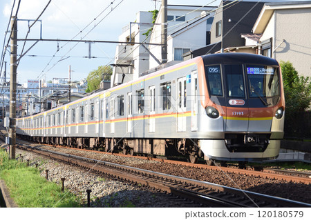 Tokyo Metro 17000 series train running on the Tokyu Toyoko Line in the evening Tokyo Metro 17000 series train running on the Tokyu Toyoko Line in the evening 120180579