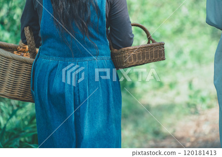 Woman with woven basket Woman with woven basket 120181413