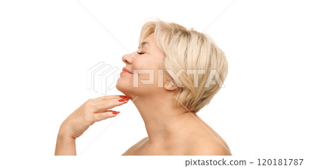 Woman's profile highlights her healthy skin and radiates calm, self-assured beauty that comes from dedicated self-care routine. Woman's profile highlights her healthy skin and radiates calm, self-assured beauty that comes from dedicated self-care routine. 120181787