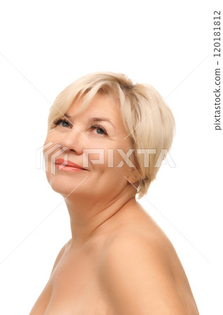 Portrait of beautiful senior woman with blonde hair smiling cheerfully against white studio background. 120181812