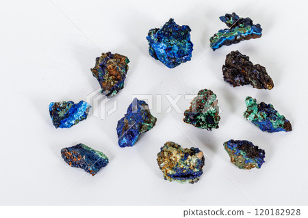 Macro mineral stone Malachite and Azurite against white background Macro mineral stone Malachite and Azurite against white background 120182928