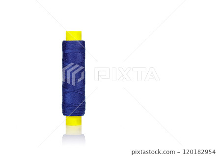 a skein of threads of blue color macro on a white background 120182954