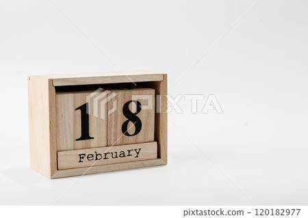 Wooden calendar February 18 on a white background Wooden calendar February 18 on a white background 120182977