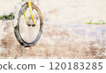 Painting of a flat tire wheel of bicycle parking on concrete sidewalk beside a road, need to be repaired, the moment of stillness and an unexpected pause in a journey. 120183285