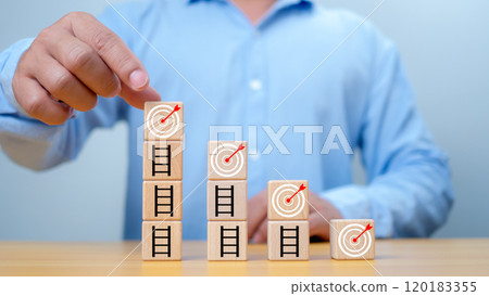 Dartboard with arrow on the top of ladders step for target and goal concept. 120183355
