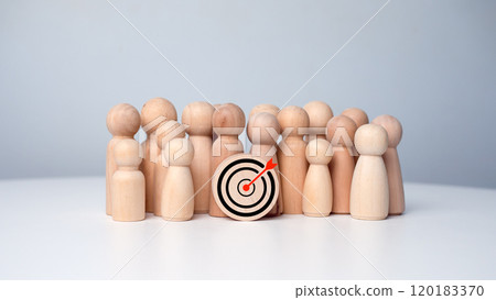 Wooden dolls standing around dart board for creating and targeting business objectives. Target concept of business and personnel in a company. Marketing solutions, targets for business investment. Wooden dolls standing around dart board for creating and targeting business objectives. Target concept of business and personnel in a company. Marketing solutions, targets for business investment. 120183370