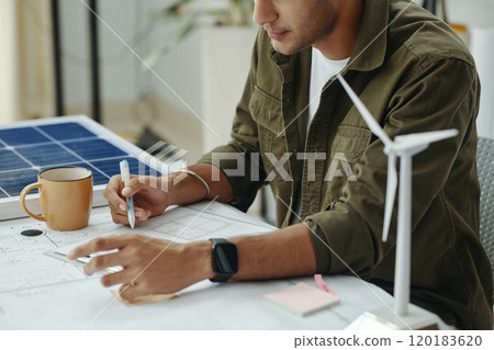 Engineer Working Over Blueprint Of New Ecology System Engineer Working Over Blueprint Of New Ecology System 120183620