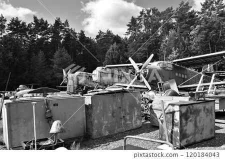 Black and white image. Old planes in the aviation museum. 120184043