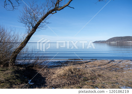 A beautiful lake view in the morning. A mist over the blue lake 120186219