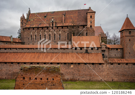 The Castle of the Teutonic Order in Malbork in the Pomerania region, Poland. This is the largest castle in the world measured by land area and a UNESCO World Heritage Site 120186246